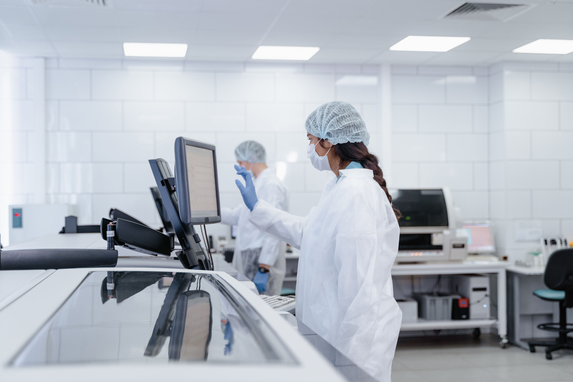 Clinical research specialists working with structured study data on connected laboratory information systems